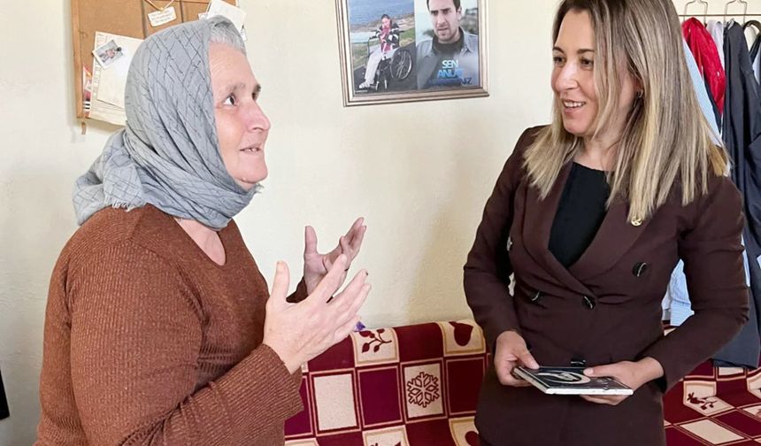 ÜLKÜ OCAKLARI TAVAS’TAKİ ŞEHİT AİLELERİNİ ZİYARET ETTİ