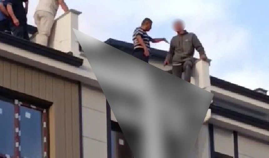 EŞİYLE TARTIŞIP ÇATIYA ÇIKAN GENCİ BAŞKAN HAYLA KURTARDI