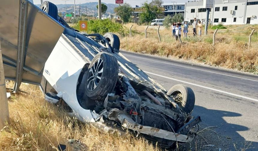 KONTROLDEN ÇIKAN OTOMOBİL TAKLA ATTI