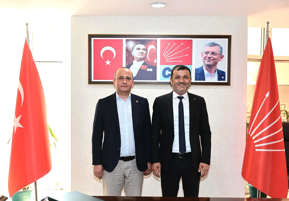 Uğur Coşkun Soldaki