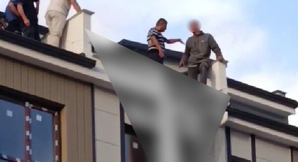 EŞİYLE TARTIŞIP ÇATIYA ÇIKAN GENCİ BAŞKAN HAYLA KURTARDI